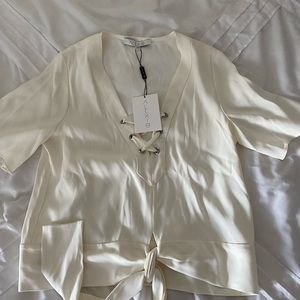 Alexis white lace up blouse size XS new with tags